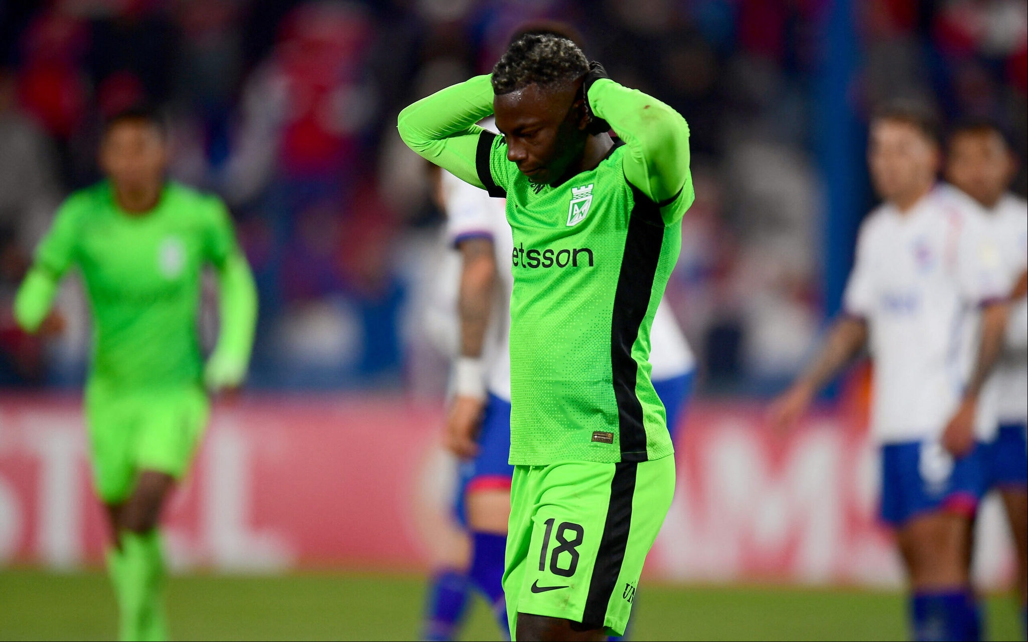 Atletico Nacional's forward #18 Marino Hinestroza reacts during the Copa Libertadores group stage football match between Uruguay's Nacional and Colombia's Atletico Nacional at the Gran Parque Central stadium in Montevideo, on May 28, 2025. (Photo by Dante FERNANDEZ / AFP)